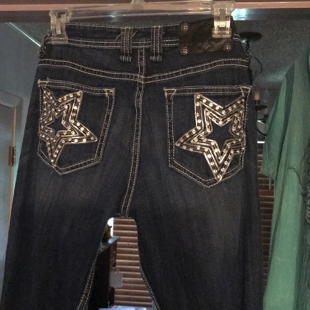 Adorable star rhinestone embellished Miss Me jeans